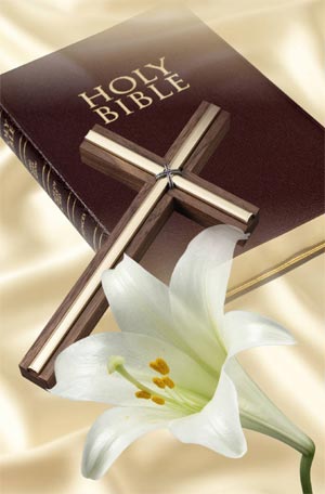 bible, cross and lily